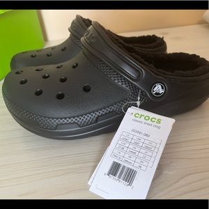 Black crocs with lining.